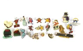 A collection of twenty-five pin badges. Relating to trains, Noddy, Rupert the Bear, Guiness, etc.