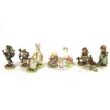 Ten mid-century ceramic figurines.