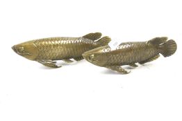 A pair of contemporary ornamental brass carp.
