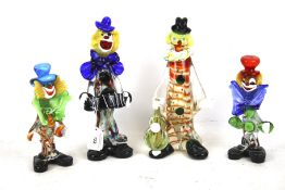 A group of four hand blown Murano style coloured glass clowns. Max.