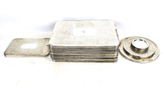 Twenty-one assorted Mappin & Webb silver plated place mats.