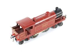 A Hornby O gauge tinplate clockwork locomotive. 4-4-4, LMS livery no. 2107.