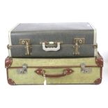 Two assorted vintage suitcases from the 1960s.