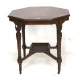 An Edwardian inlaid octagonal table.