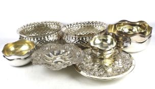 A collection of large silver plated bowls.