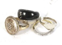 Five contemporary rings.