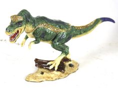 A contemporary trinket box modelled as a dinosaur.