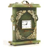A mid-century onyx mantle clock.