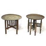 Two 20th century brass topped tables with folding stands.