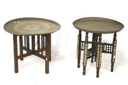 Two 20th century brass topped tables with folding stands.