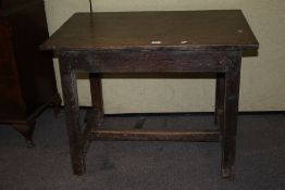 A Victorian small chestnut refectory style table. On square supports and stretchers.
