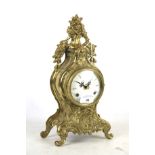 An Imperial contemporary rococo style Italian made brass mantel clock.