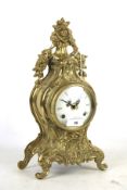 An Imperial contemporary rococo style Italian made brass mantel clock.