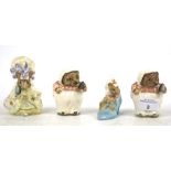 A group of four vintage Beswick Beatrix Potter figures.