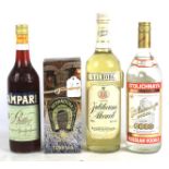 Four assorted bottles of spirits.