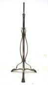 A vintage cast metal lamp stand.