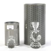 Two boxed pieces of Swarovski crystal. Comprising a candlestick, H13.
