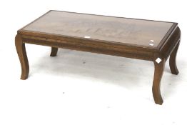 A contemporary wooden coffee table.