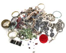 An assortment of costume jewellery. Including necklaces, bangles, bracelets, etc.