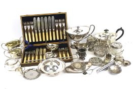 An assortment of silver plate and stainless steel.