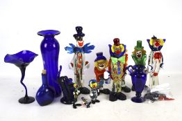 A group of assorted glass clowns and Bristol blue glass. Including nine Murano style glass clowns.