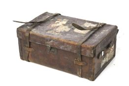 Vintage leather trunk and contents. Trunk has two leather straps and handles at either end.