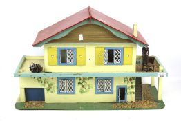 A 1960s wooden dolls house.