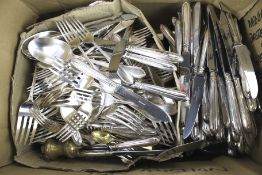 An assortment of silver plated flatware cutlery.