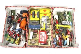 A collection of assorted playworn and boxed diecast vehicles. Including Dinky, Matchbox, Lledo, etc.