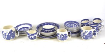 A six piece tea service and dinner service in the 'Old Willow' pattern.