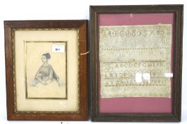 A signed pencil sketch of a young woman and a Victorian sampler. Both framed and glazed.