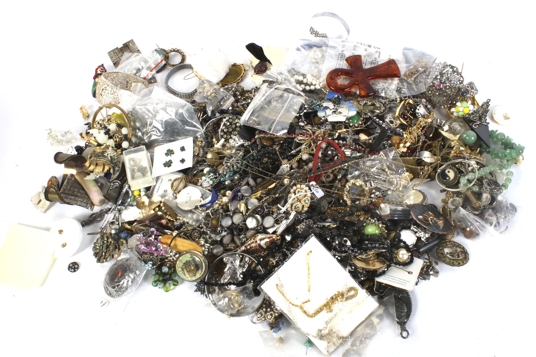 A large assortment of costume jewellery within a wooden box marked 'Bread'.