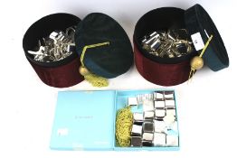 An assortment of John Lewis silver plated items.