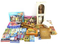 A large assortment of toys and vintage games.