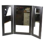 A three section dressing table mirror. With black wooden frame.