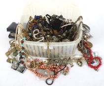 An assortment of costume jewellery. Including necklaces, bracelets, beads, watches, etc.