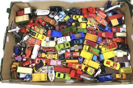 A box of assorted playworn diecast model vehicles.