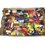 A box of assorted playworn diecast model vehicles.