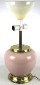 A large contemporary table lamp. The pin