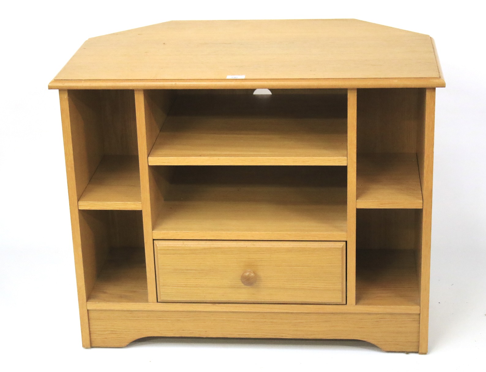 A contemporary pine TV cabinet. The cent