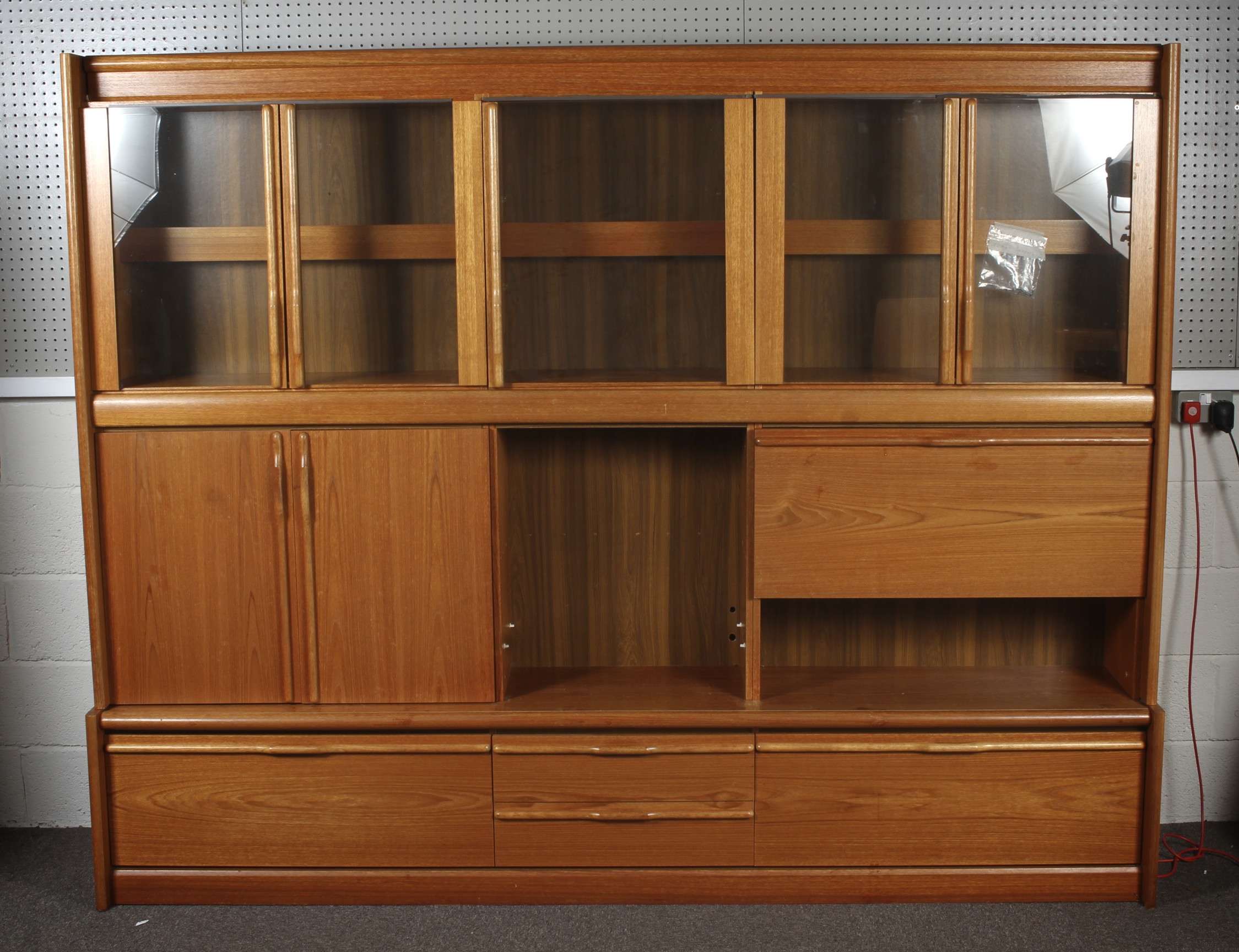 A 1960s G-Plan teak wall cabinet. With t