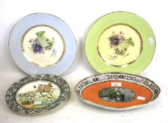 Four ceramic plates. Comprising two by C