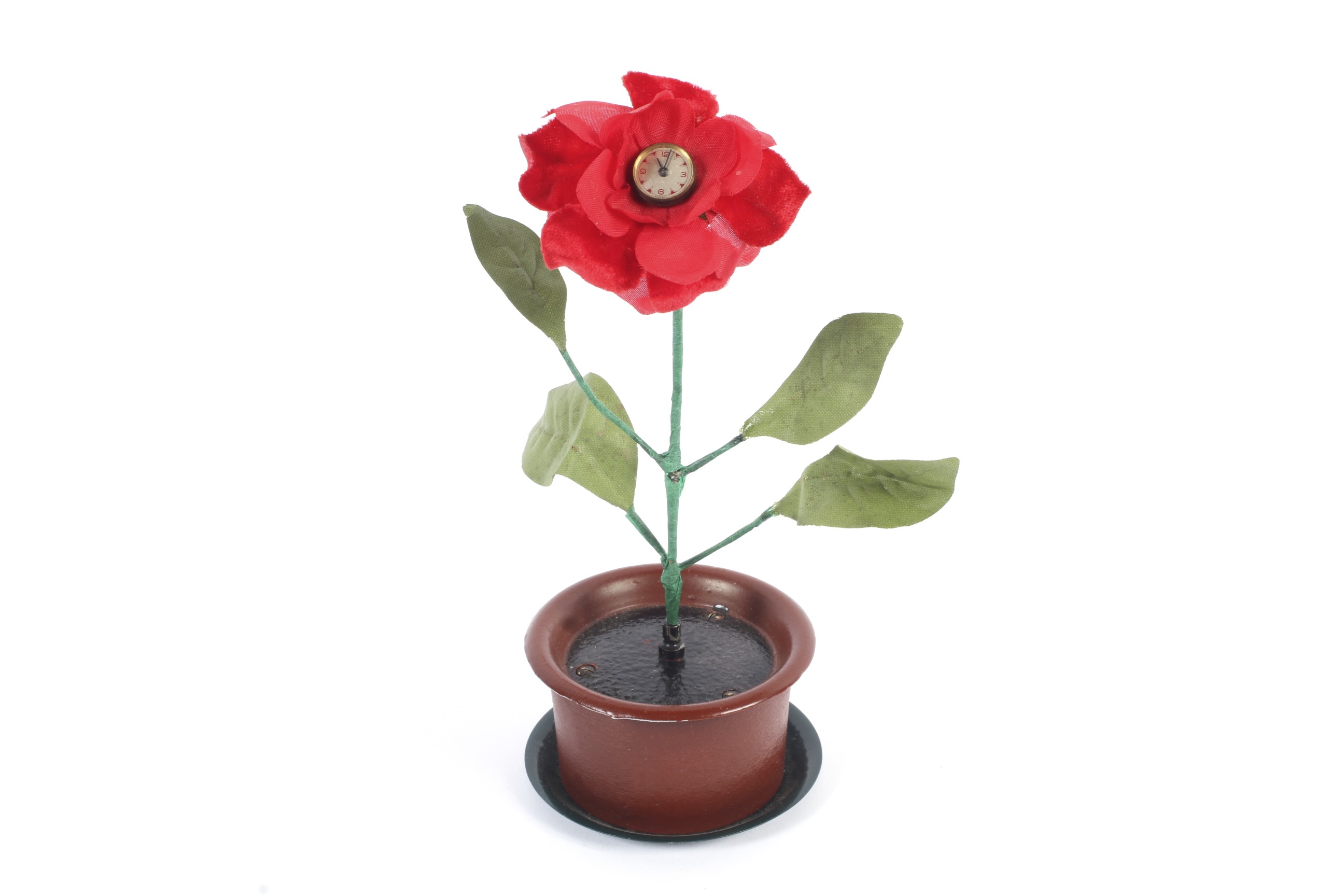 A German felt flower mounted clock in or