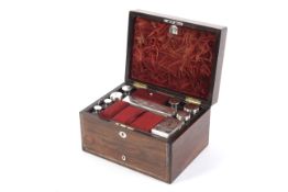 A Victorian rosewood fitted toilette box