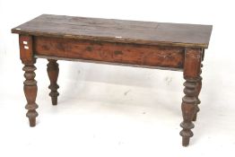 A Victorian stained oak plank top table.