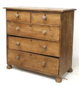 A 20th century pine chest of drawers. Tw