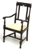 A 19th century oak armchair. The frame w