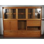 A 1960s G-Plan teak wall cabinet. With t