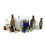 A collection of assorted vintage bottles