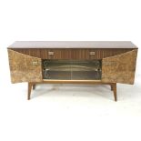 A 1960s style formica sideboard. Central